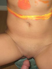 Asian gf Lisa Ly covers her big tits in paint before fucking her man friend