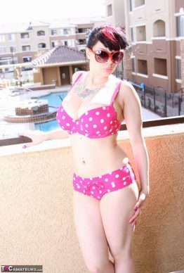 41259684 016 361d 262x388 - Busty amateur chick Susy Rocks shows herself shades clad in a polka-dot bikini on the balcony