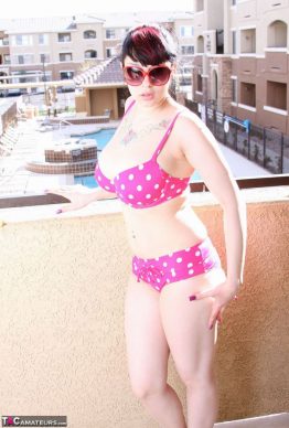 41259684 017 680f 262x388 - Busty amateur chick Susy Rocks shows herself shades clad in a polka-dot bikini on the balcony